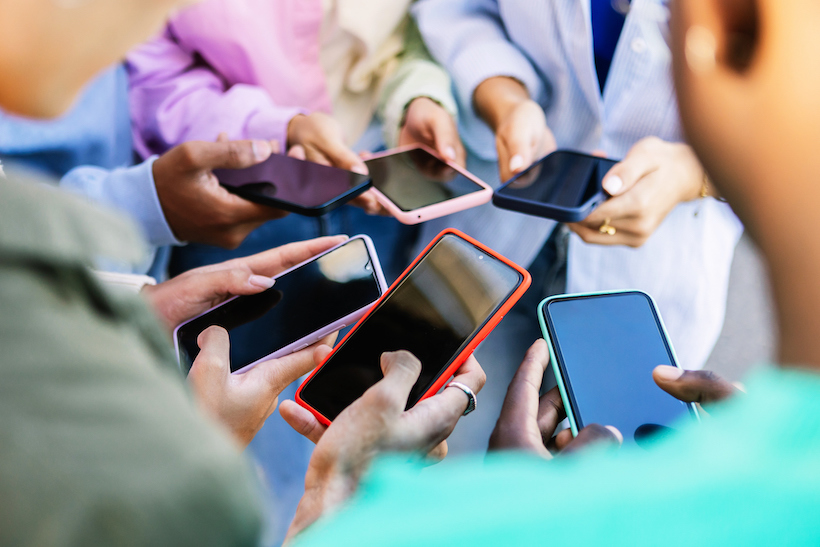 Hands holding smartphones