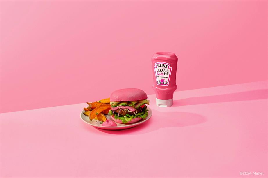 A burger in a bap, garnished with Heinz's pink Barbiecue sauce, against a pink background