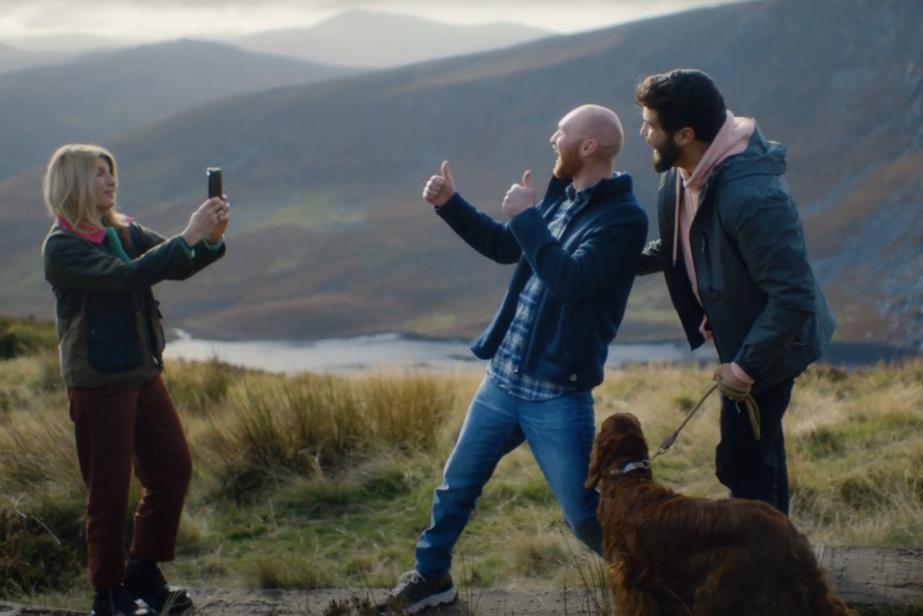 Tourism Ireland: 2023 ad starring Sharon Horgan, who is photographing a couple of men and their dog on the hills of Ireland